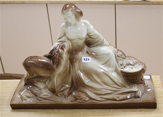 A large ceramic model of a lady and a deer, signed Polbert